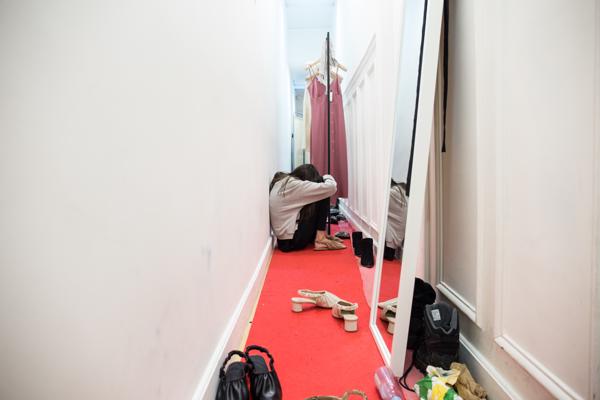 Svetlana is exhausted after many appointments. More clients could come anytime to see the collections. Fashion week sales campaign lasts 9 days. The girls are spending 10 hours a day sharing a shallow corridor in a beautiful Haussmanian building in the center of Paris. the halls are absolutely magnificent and finely decorated. the models come out of the hallways using the ancient passages intended for servants. even meals are eaten in the same environment. when there is a break between clients, they take the opportunity to rest or chat. they take turns to go to the bathroom. sometimes the most tired ones go home early, alternating so that each one makes the same hours.